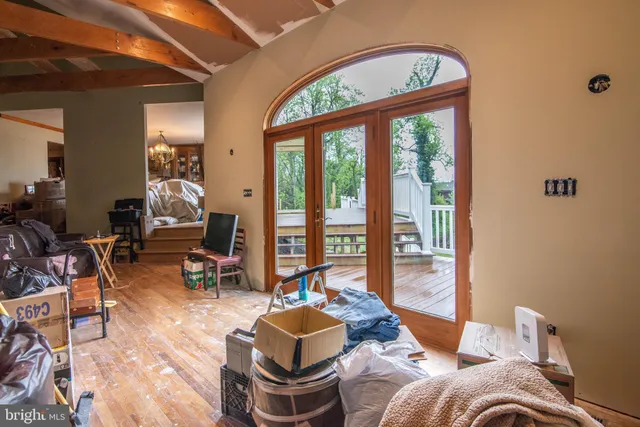 a living room with a couch and a window