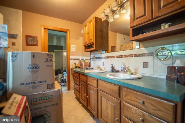 a reading room with furniture and a window