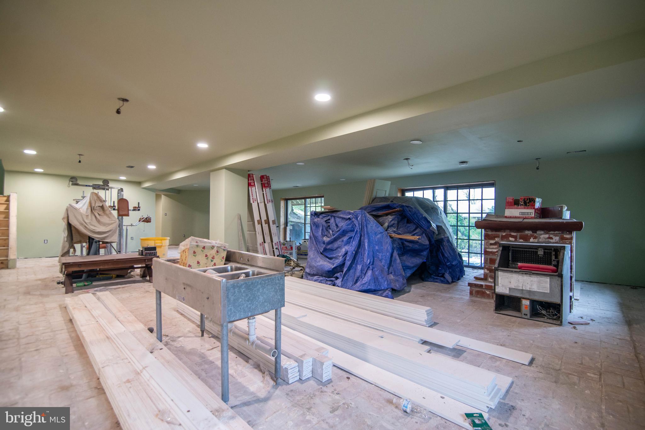 38 Osprey Way Elkton, MD 21921 - Photo 32 of 52 a living room with furniture a air conditioner and a table