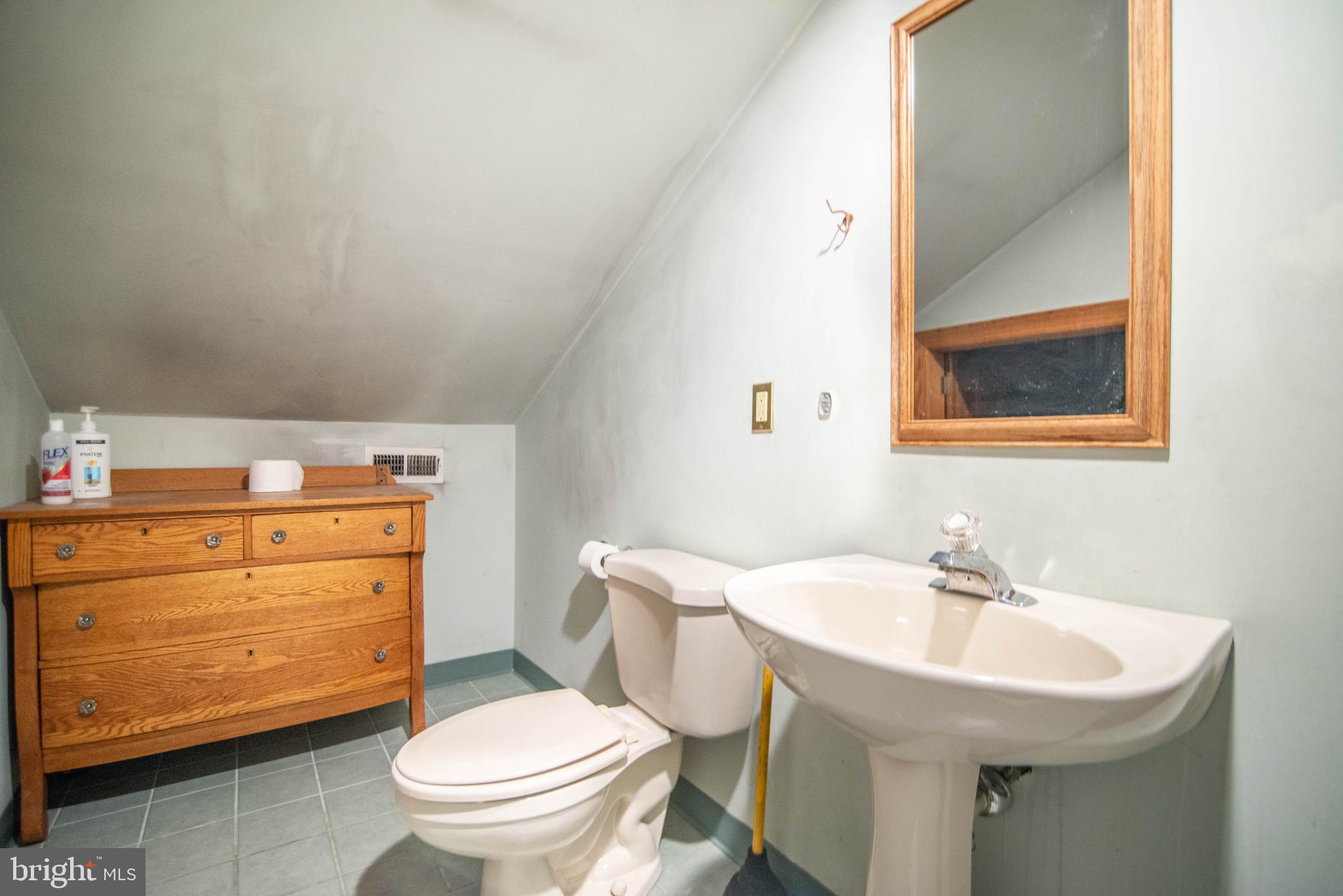 38 Osprey Way Elkton, MD 21921 - Photo 47 of 52 a bathroom with a sink toilet and a mirror