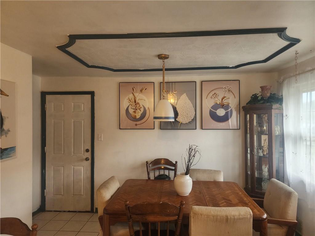 5014 3rd Street McKeesport, PA 15132 - Photo 16 of 28 a dining room with furniture and window