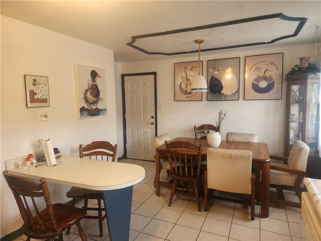 5014 3rd Street McKeesport, PA 15132 - Photo 17 of 28 a view of a dining room with furniture