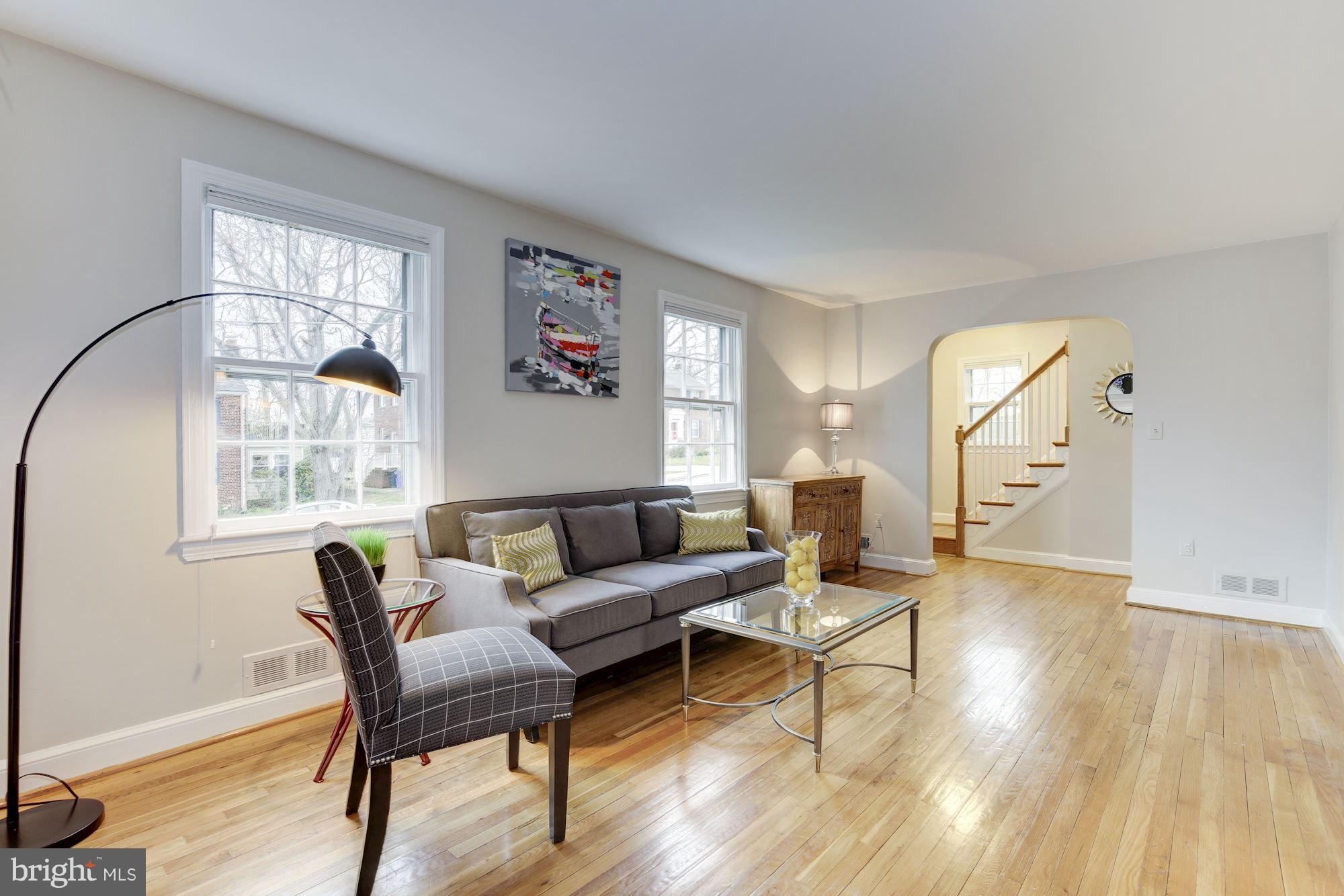 9012 Walden Road Silver Spring, MD 20901 - Photo 4 of 17 a living room with furniture and a window