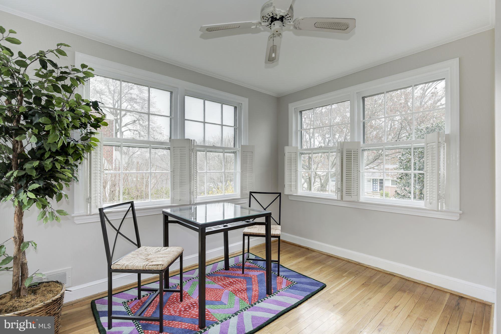 9012 Walden Road Silver Spring, MD 20901 - Photo 5 of 17 a view of a livingroom with furniture window and wooden floor