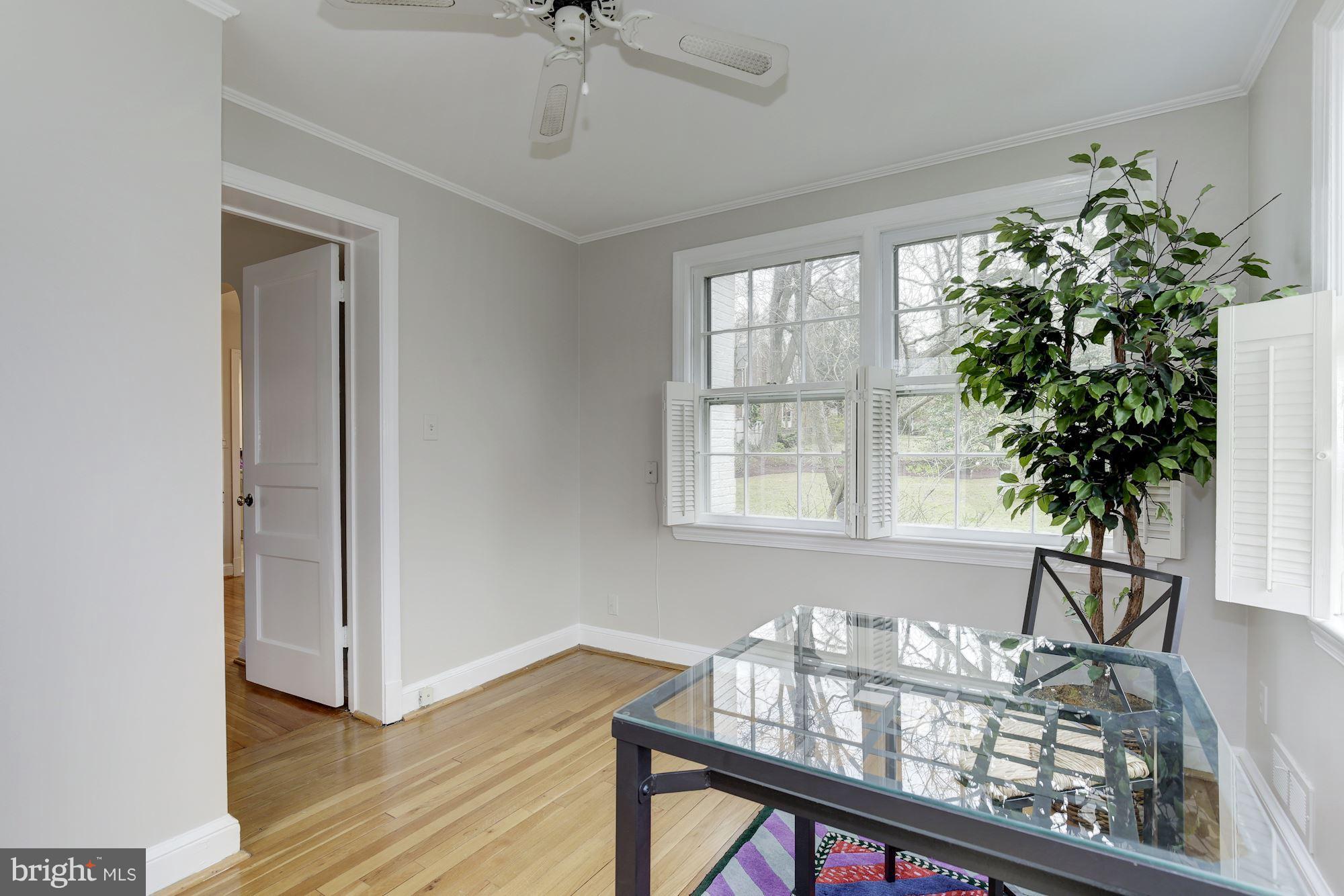 9012 Walden Road Silver Spring, MD 20901 - Photo 6 of 17 a view of a livingroom with furniture and window