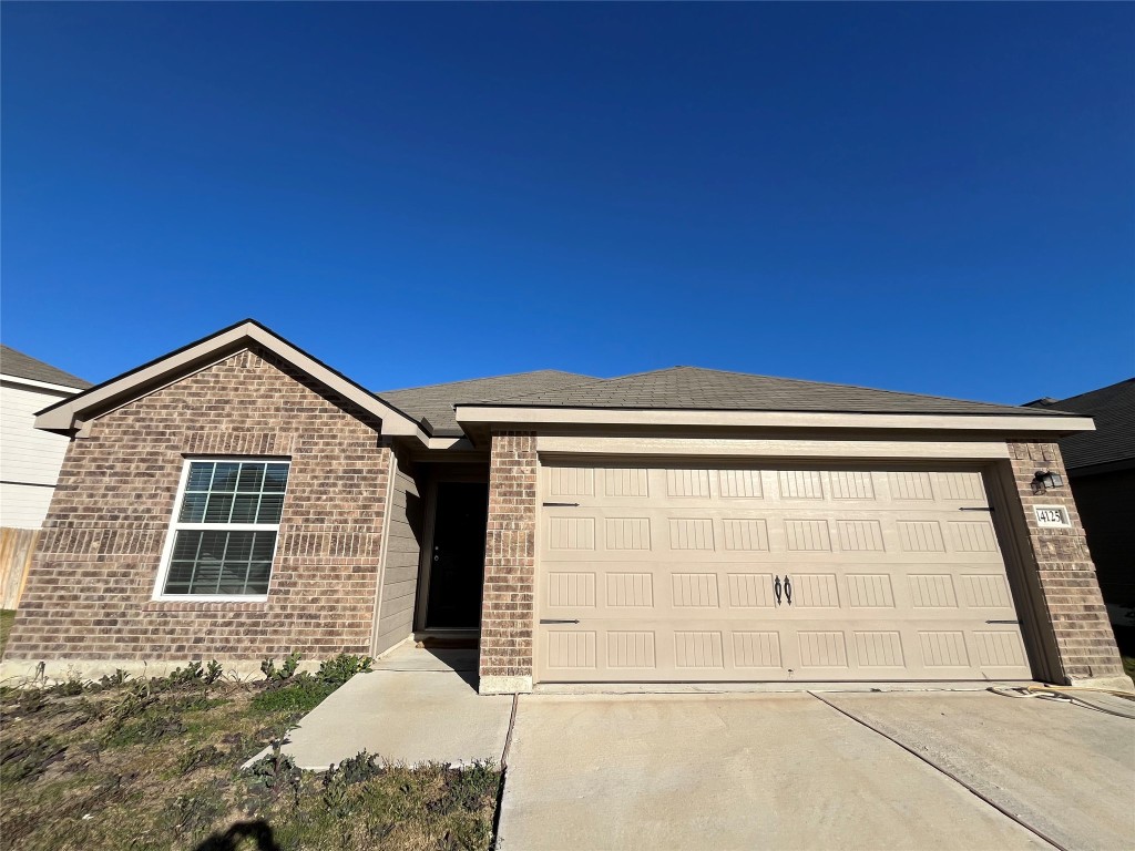 14125 Prospector Way Elgin, TX 78621 - Photo 1 of 16 Front of house