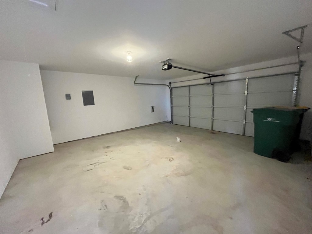 14125 Prospector Way Elgin, TX 78621 - Photo 15 of 16 2 car garage