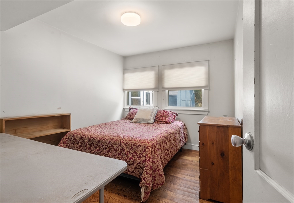 17 Chandler Road Malden, MA 02148 - Photo 16 of 19 a bedroom with a bed and window