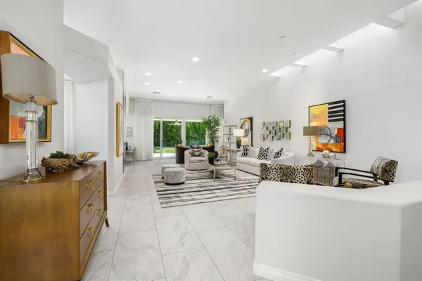 a kitchen with sink and couch