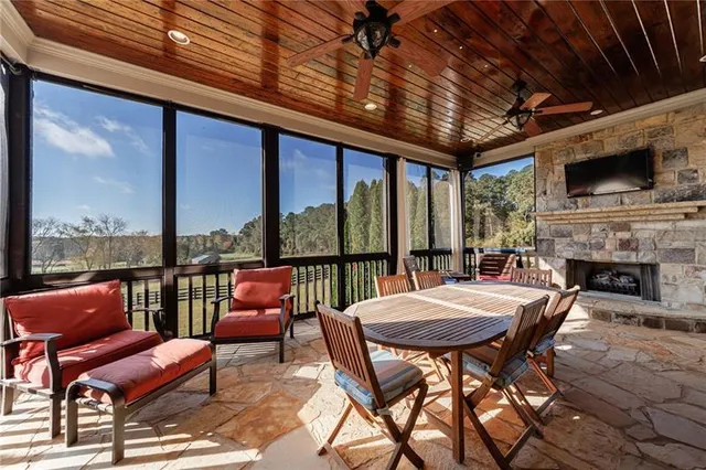 a outdoor space with patio lots of furniture and outdoor view