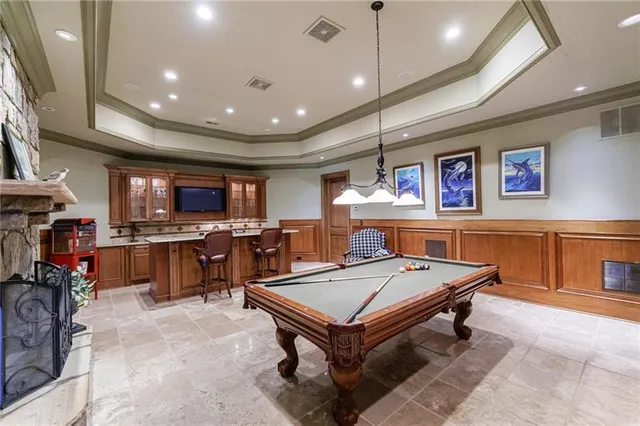 a room with furniture and a flat screen tv