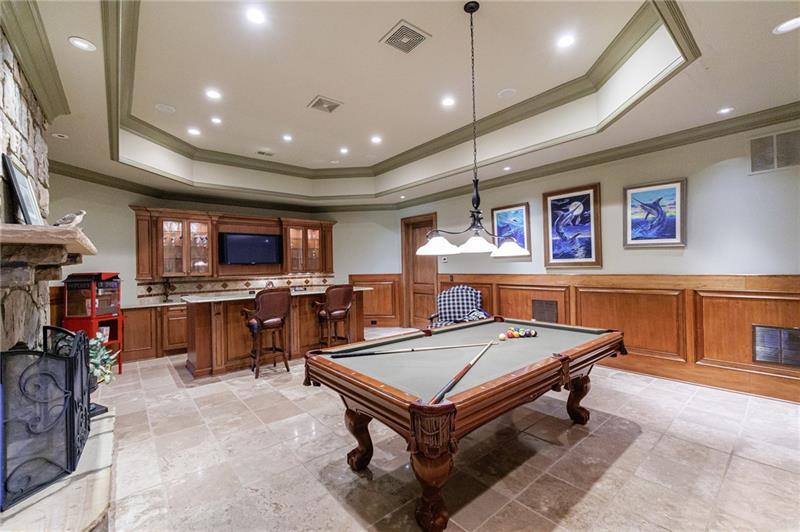 15750 Freemanville Road Milton, GA 30004 - Photo 29 of 30 a room with furniture and a flat screen tv