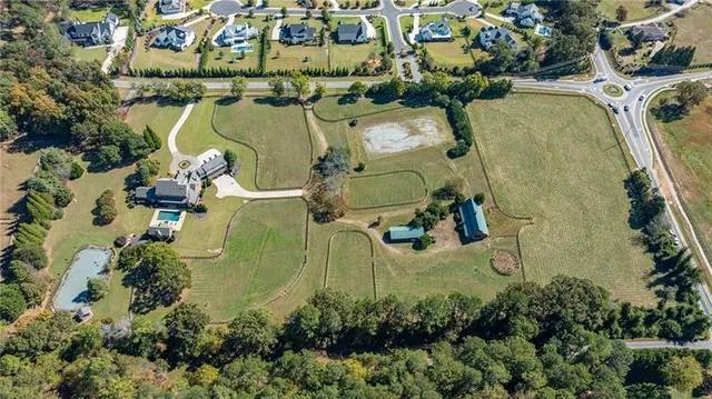 an aerial view of a highlighted house