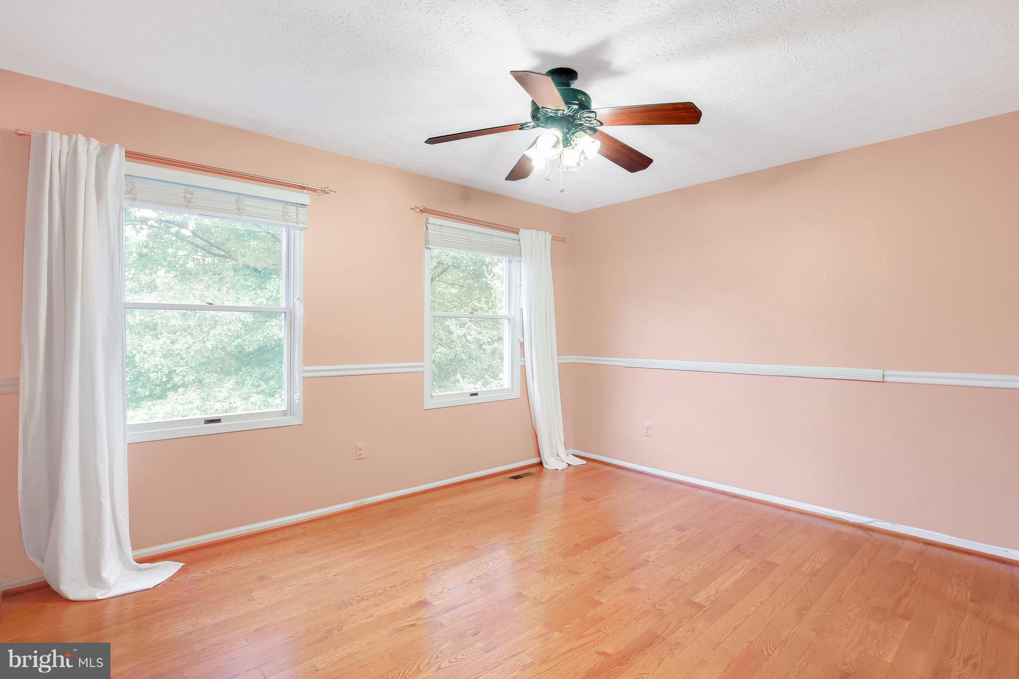 14908 Windmill Terrace Silver Spring, MD 20905 - Photo 16 of 30 a view of an empty room with a window