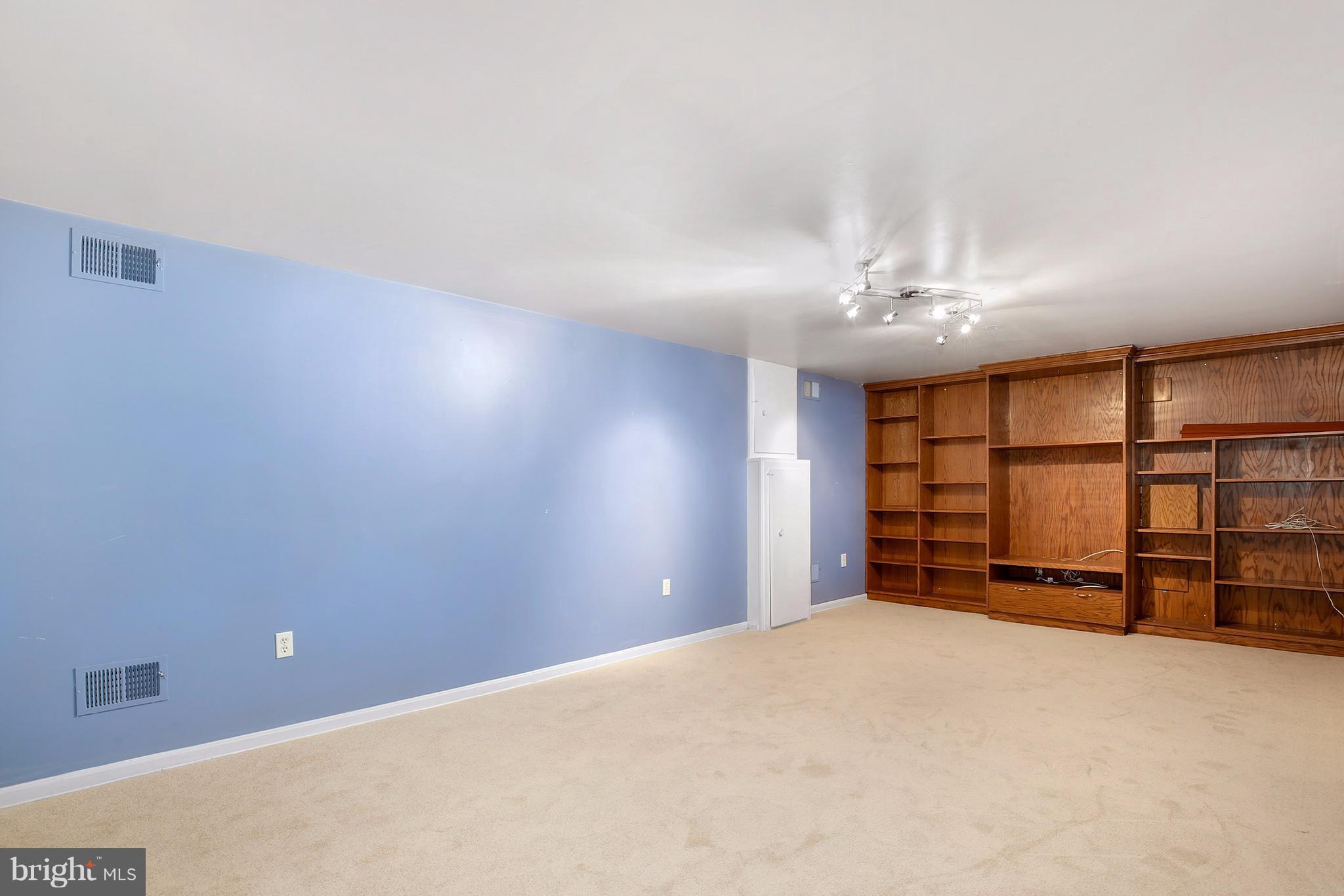 14908 Windmill Terrace Silver Spring, MD 20905 - Photo 20 of 30 a view of an empty room with a window