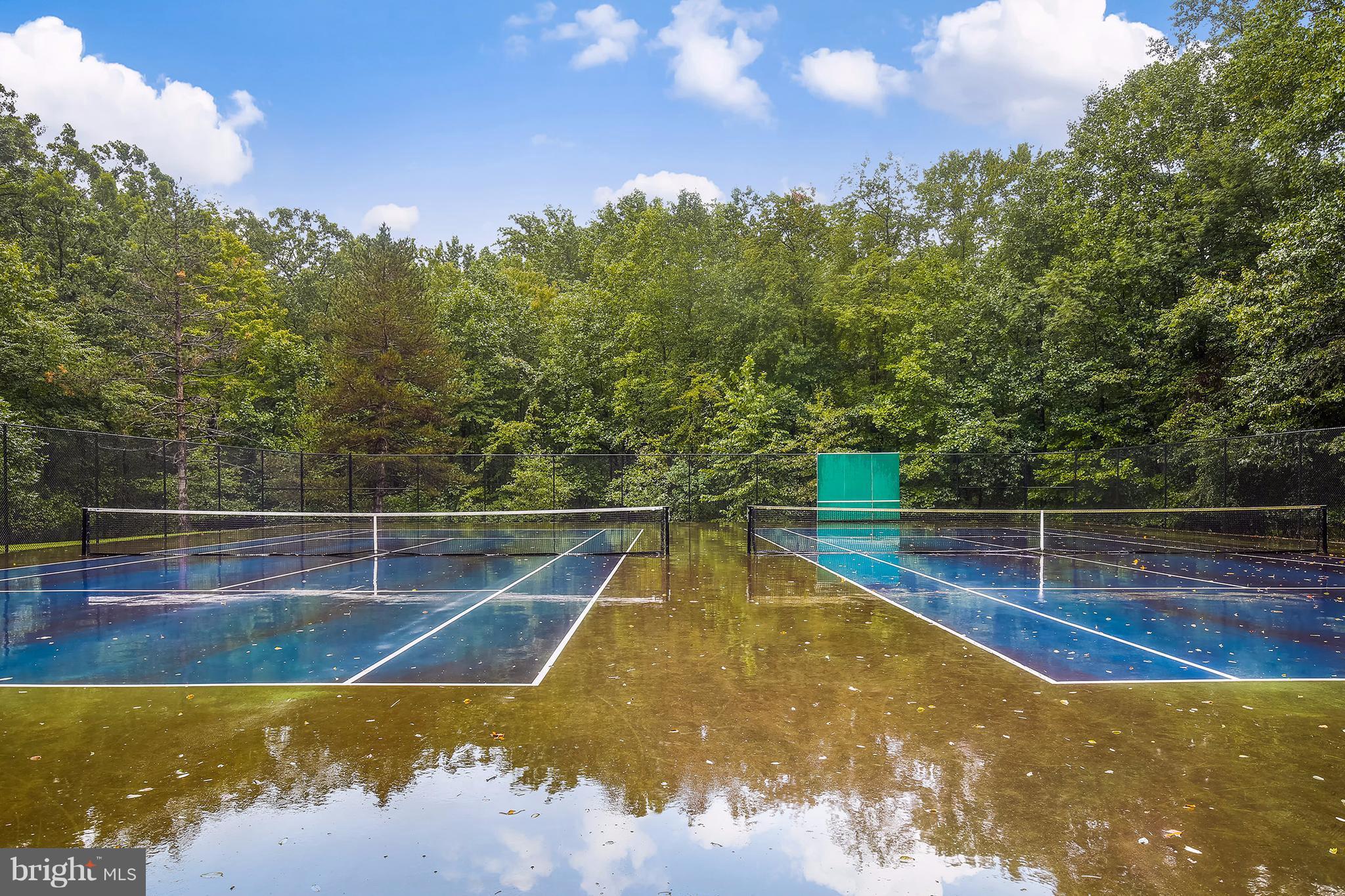 14908 Windmill Terrace Silver Spring, MD 20905 - Photo 28 of 30 a view of a swimming pool with an outdoor seating