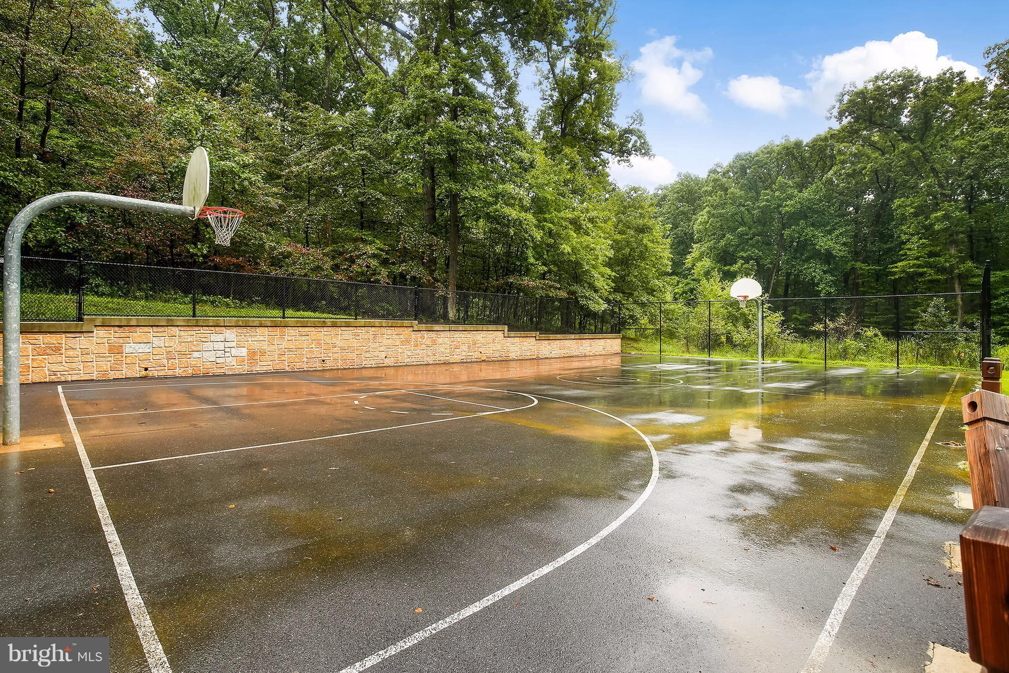14908 Windmill Terrace Silver Spring, MD 20905 - Photo 29 of 30 a view of a swimming pool with a yard