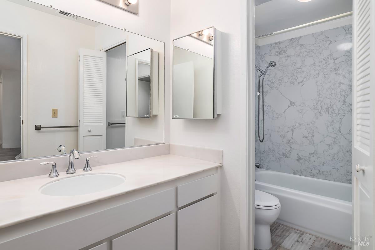 16 California Condor Way Novato, CA 94949 - Photo 8 of 21 a bathroom with a sink toilet tub and shower