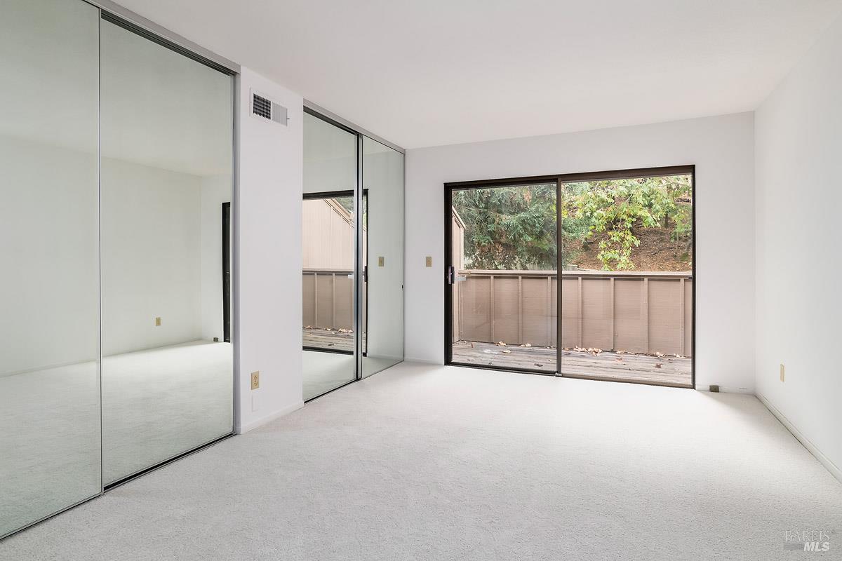 16 California Condor Way Novato, CA 94949 - Photo 9 of 21 a view of an empty room with a window