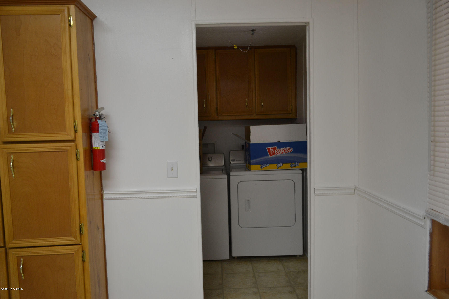 307 Prairie Road Moxee, WA 98936 - Photo 6 of 9 a room with storage and utility