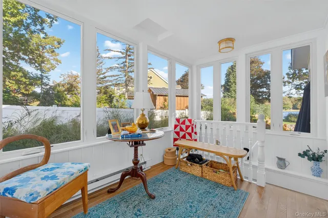 a sitting area with furniture and window
