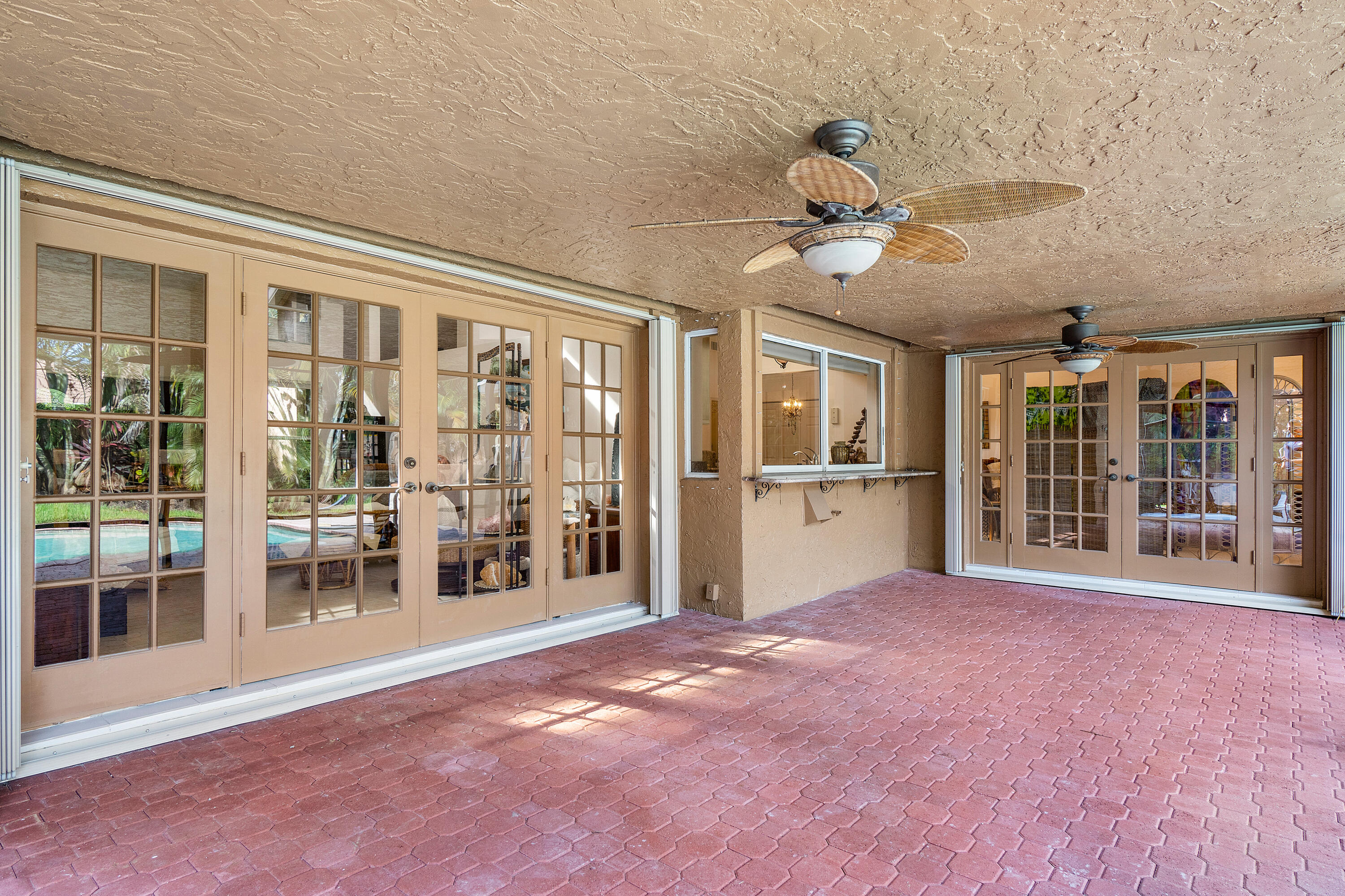 2305 Rabbit Hollowe Circle Delray Beach, FL 33445 - Photo 23 of 47 Covered Patio