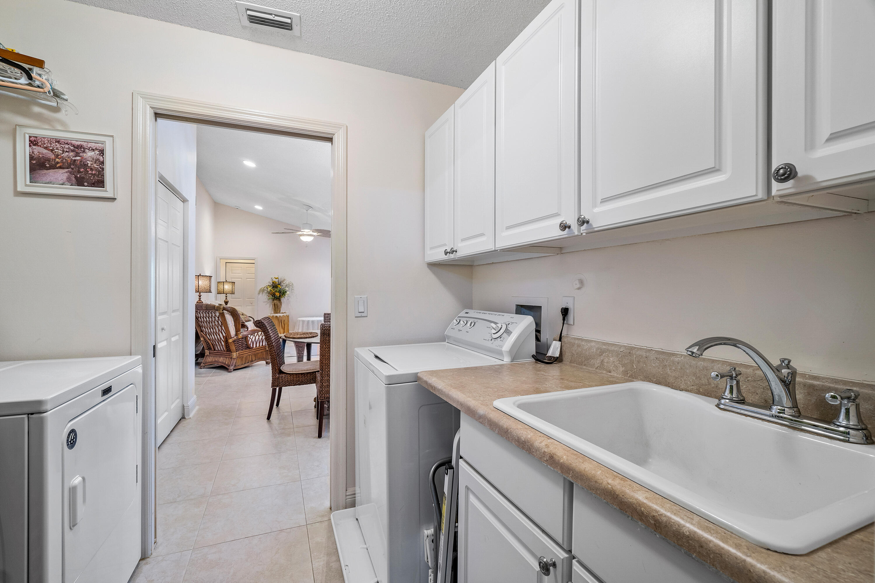 2305 Rabbit Hollowe Circle Delray Beach, FL 33445 - Photo 27 of 47 Laundry/Utility Closet