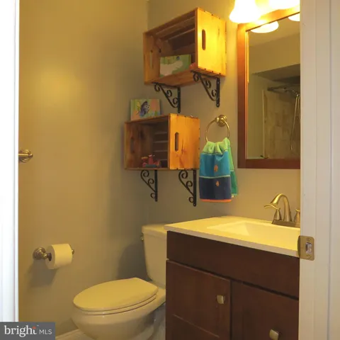 a bathroom with a shower and a mirror