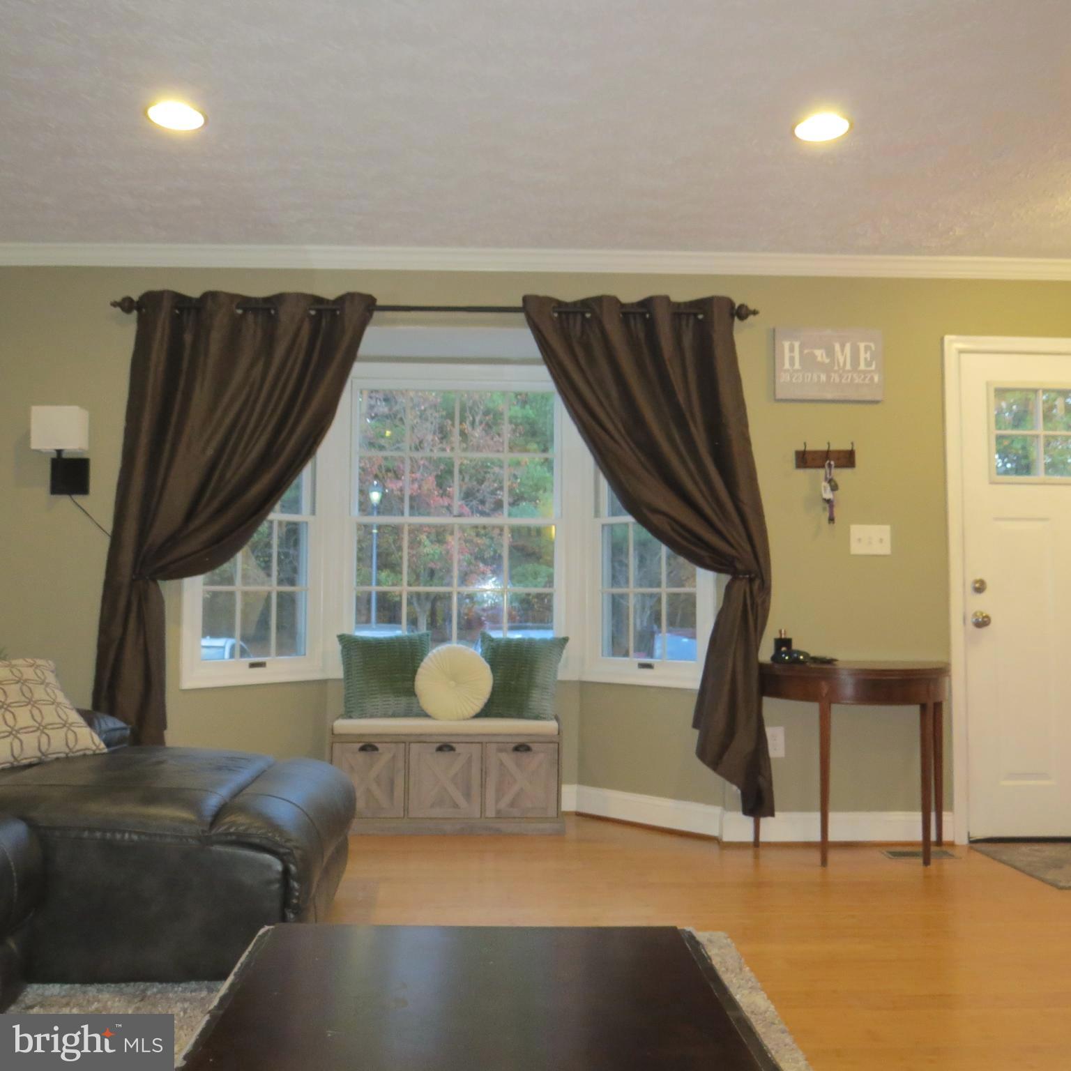 22 Hobb Court Perry Hall, MD 21128 - Photo 8 of 42 a living room with furniture and a large window