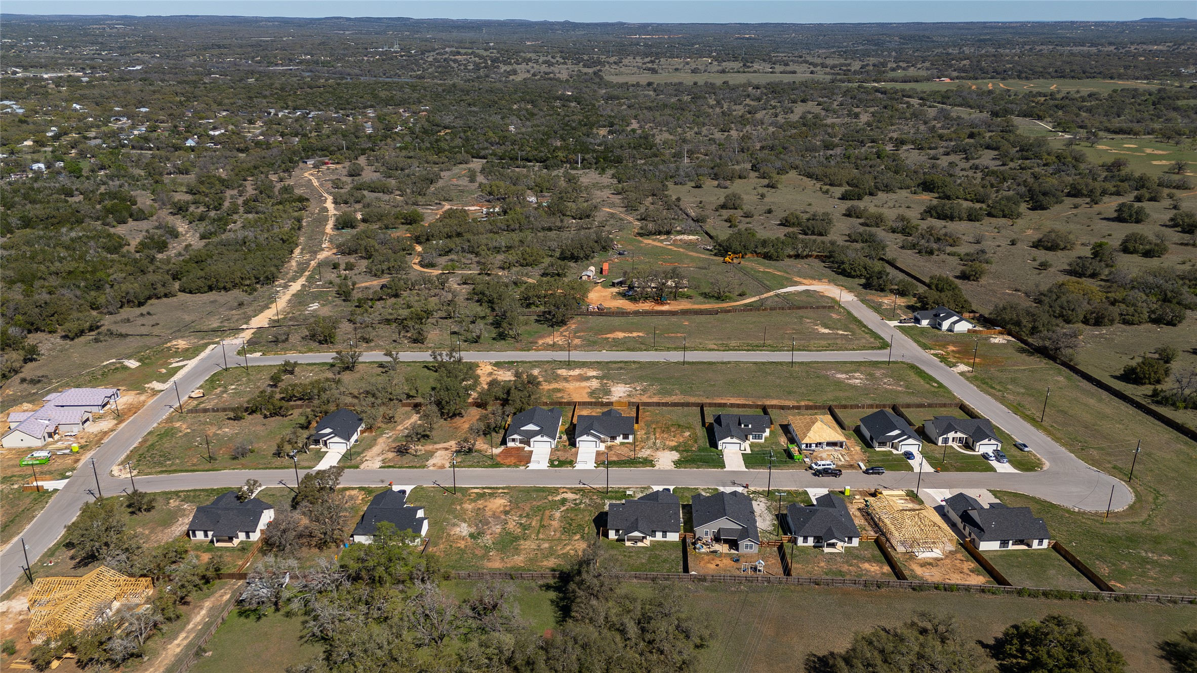 110 Sandy Oaks Ranch Road Johnson City, TX 78636 - Photo 5 of 7 Aerial overview of property's location featuring nearby suburban area