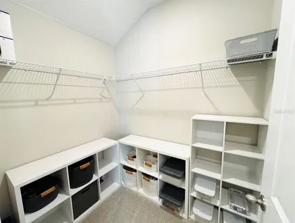 a view of an empty walk in closet