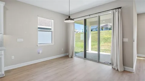 wooden floor and windows in an empty room