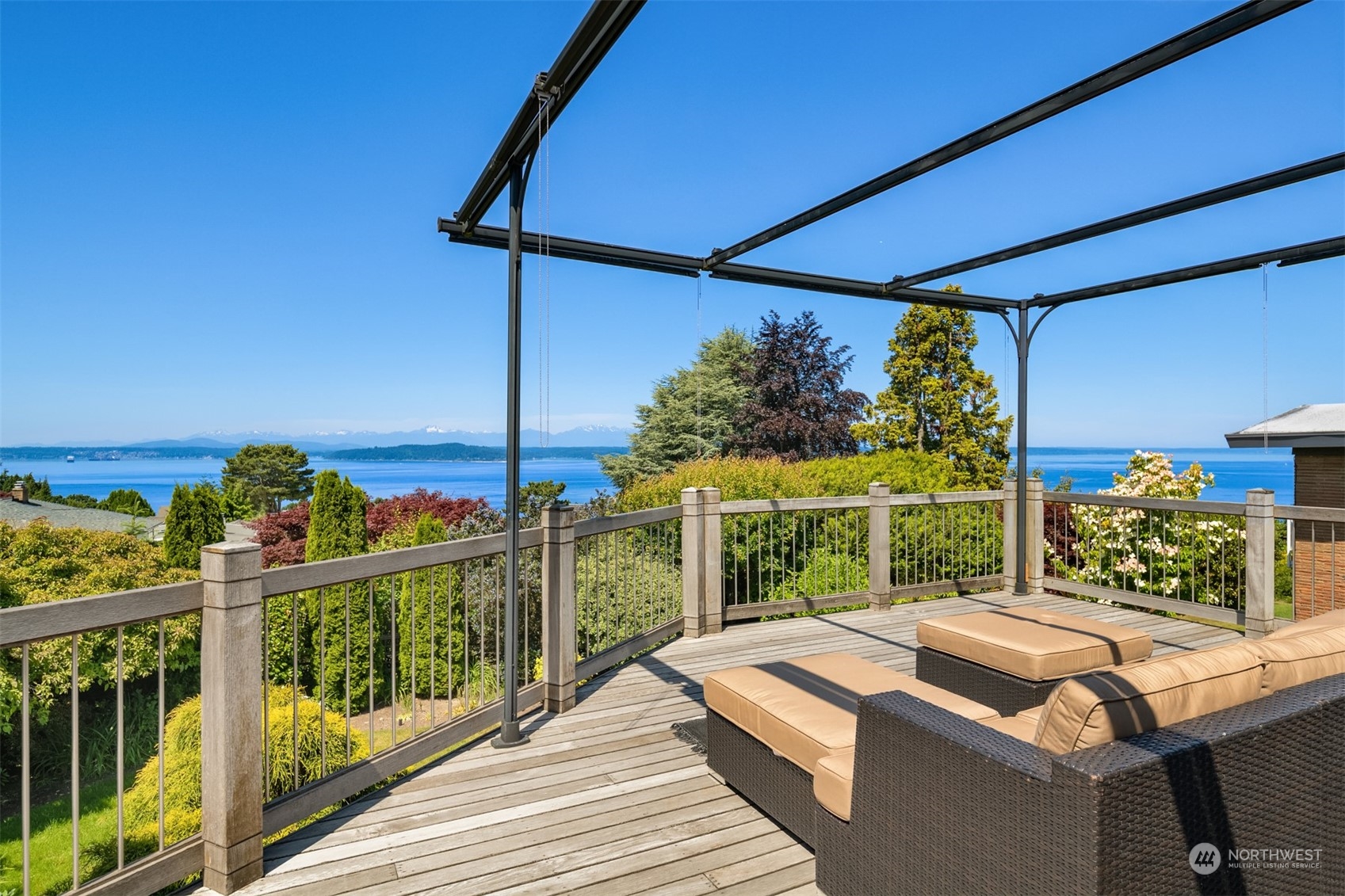 3711 55th Avenue Southwest Seattle, WA 98116 - Photo 31 of 33 a view of a balcony with couches and wooden floor