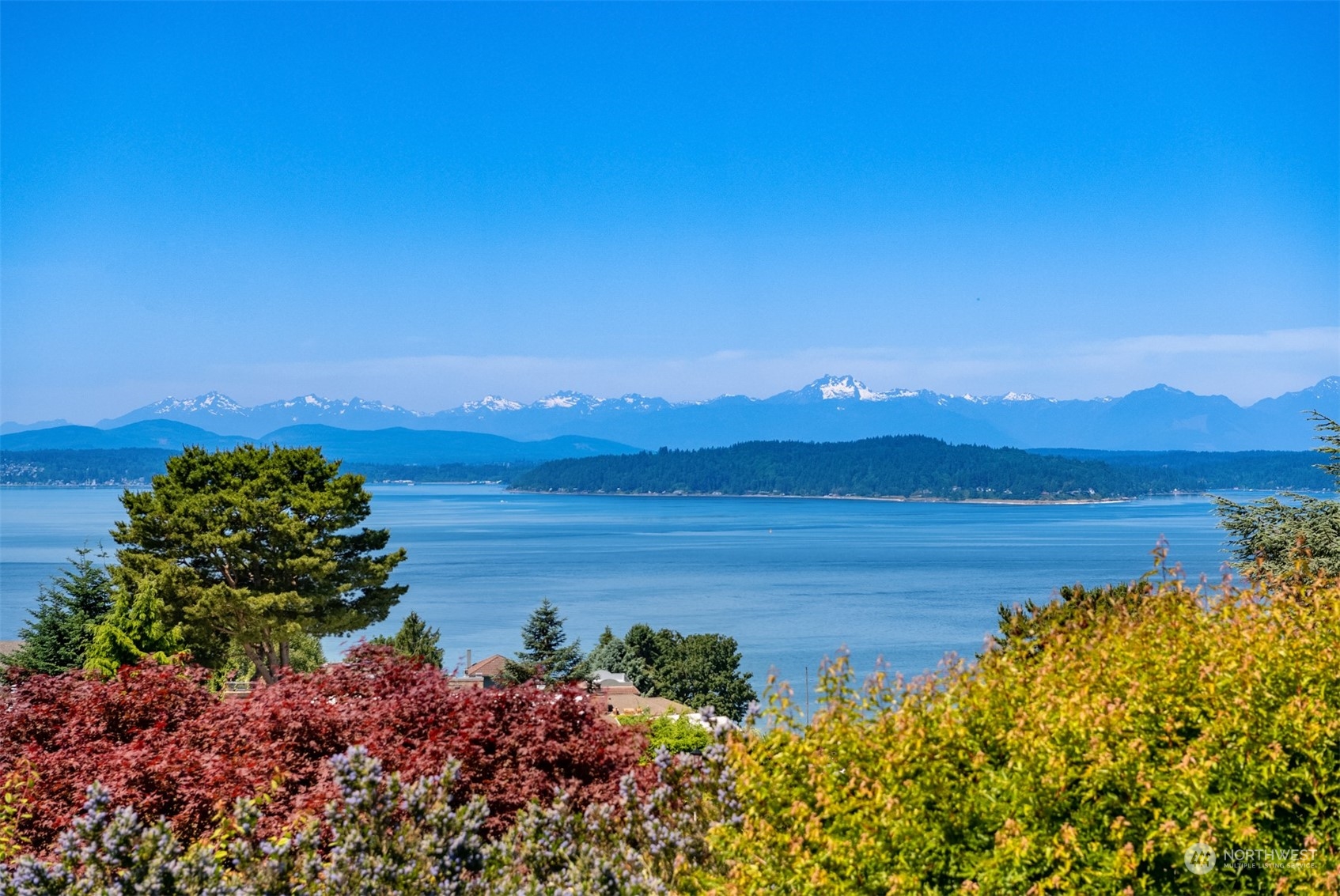 3711 55th Avenue Southwest Seattle, WA 98116 - Photo 33 of 33 a view of a lake with a city