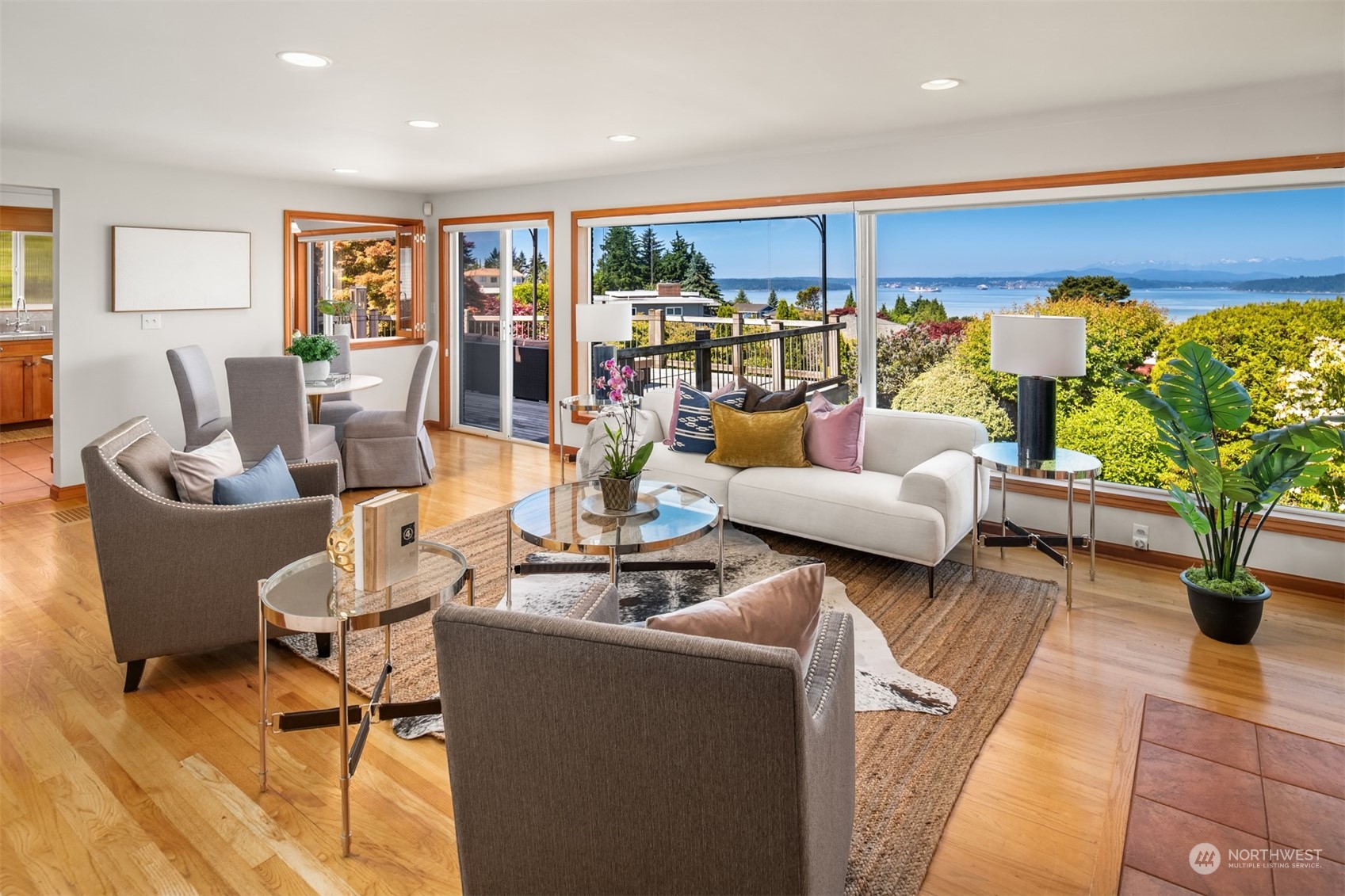 3711 55th Avenue Southwest Seattle, WA 98116 - Photo 6 of 33 a living room with furniture kitchen view and large windows