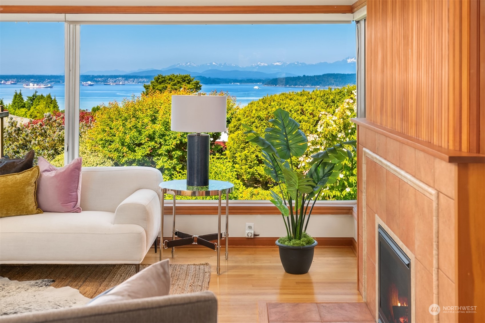 3711 55th Avenue Southwest Seattle, WA 98116 - Photo 7 of 33 a living room with furniture and a potted plant