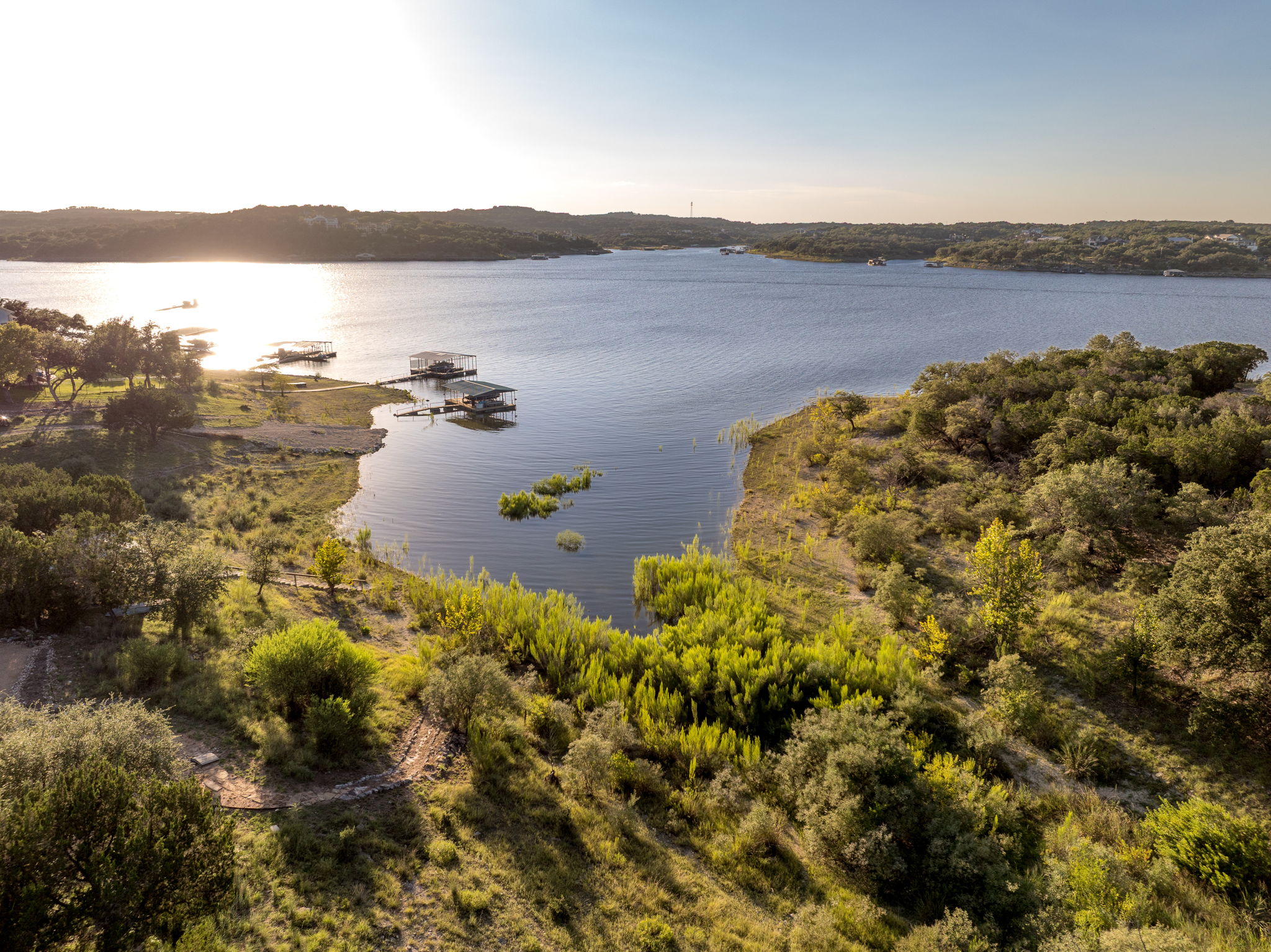 160 Lakefront Drive Point Venture, TX 78645 - Photo 1 of 17 Imagine watching the sun set over Lake Travis every day from your Custom home right here!