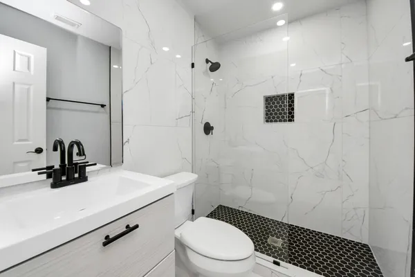 a utility room with washer and dryer