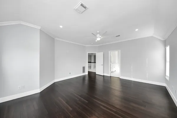 a bathroom with double vanity sinks a shower and a mirror