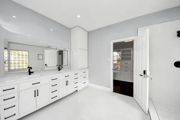 wooden floor with white cabinet