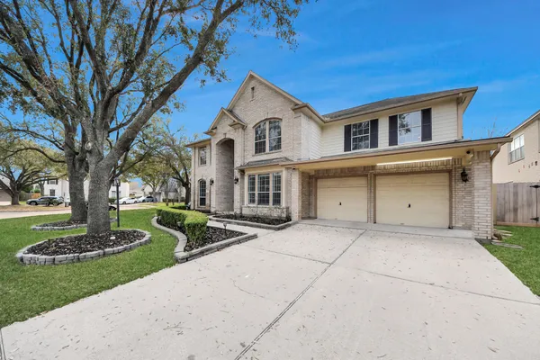 a view of a street with houses