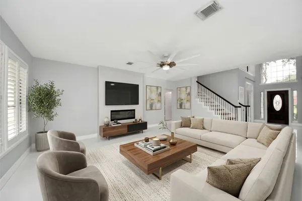 a view of a kitchen with furniture and a window