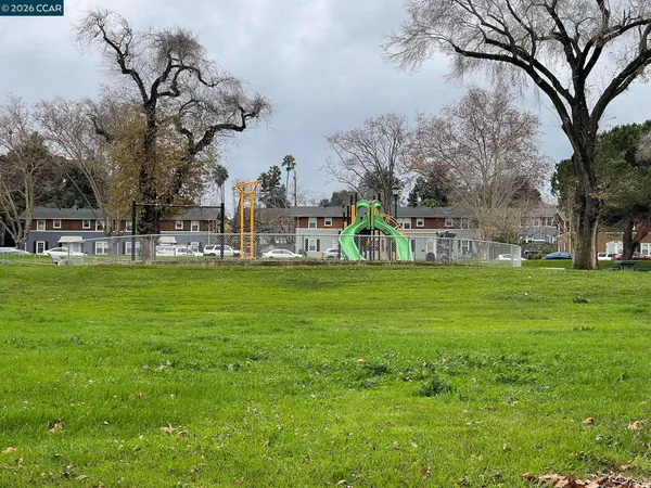 a view of outdoor space with playground