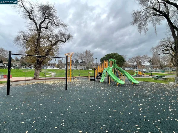 a view of a golf course with a lake