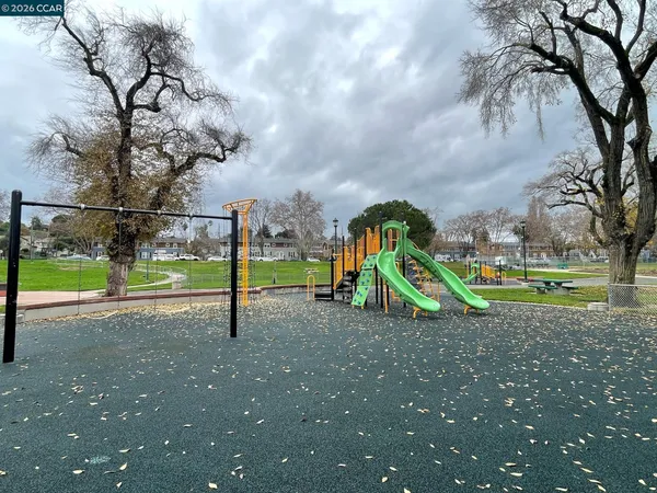 a view of a park with swings