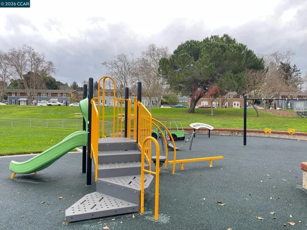 a view of a park with swings