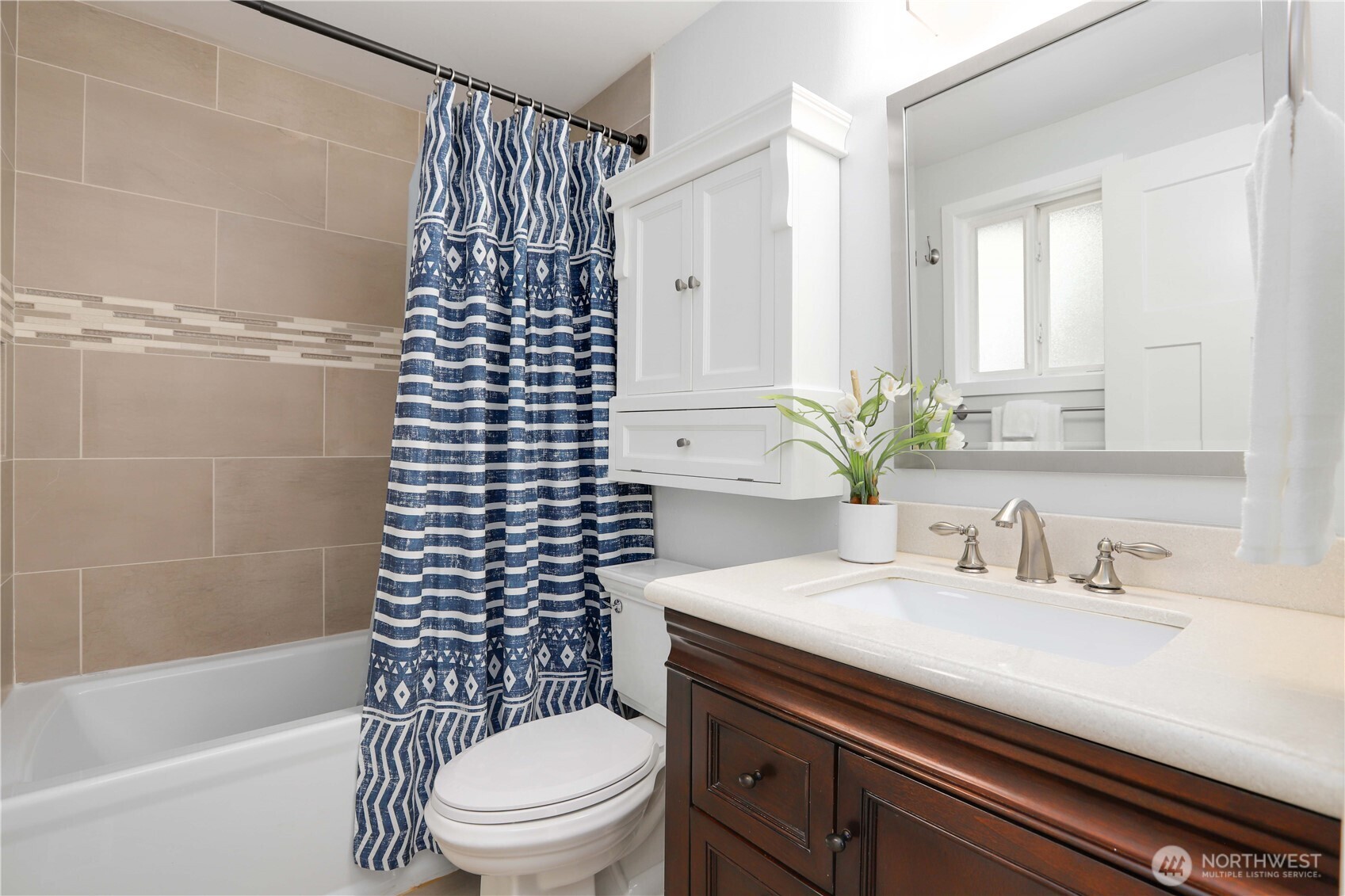 1822 171st Place Southeast Bothell, WA 98012 - Photo 13 of 36 a bathroom with a sink a toilet and shower
