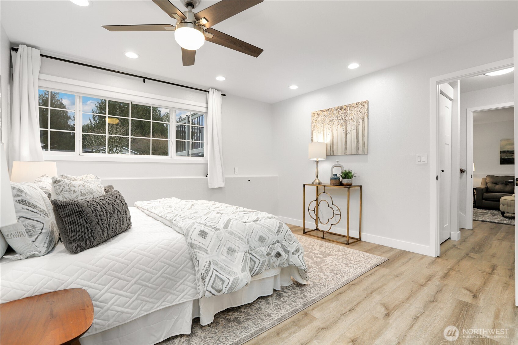 1822 171st Place Southeast Bothell, WA 98012 - Photo 14 of 36 a bedroom with a bed and a large window