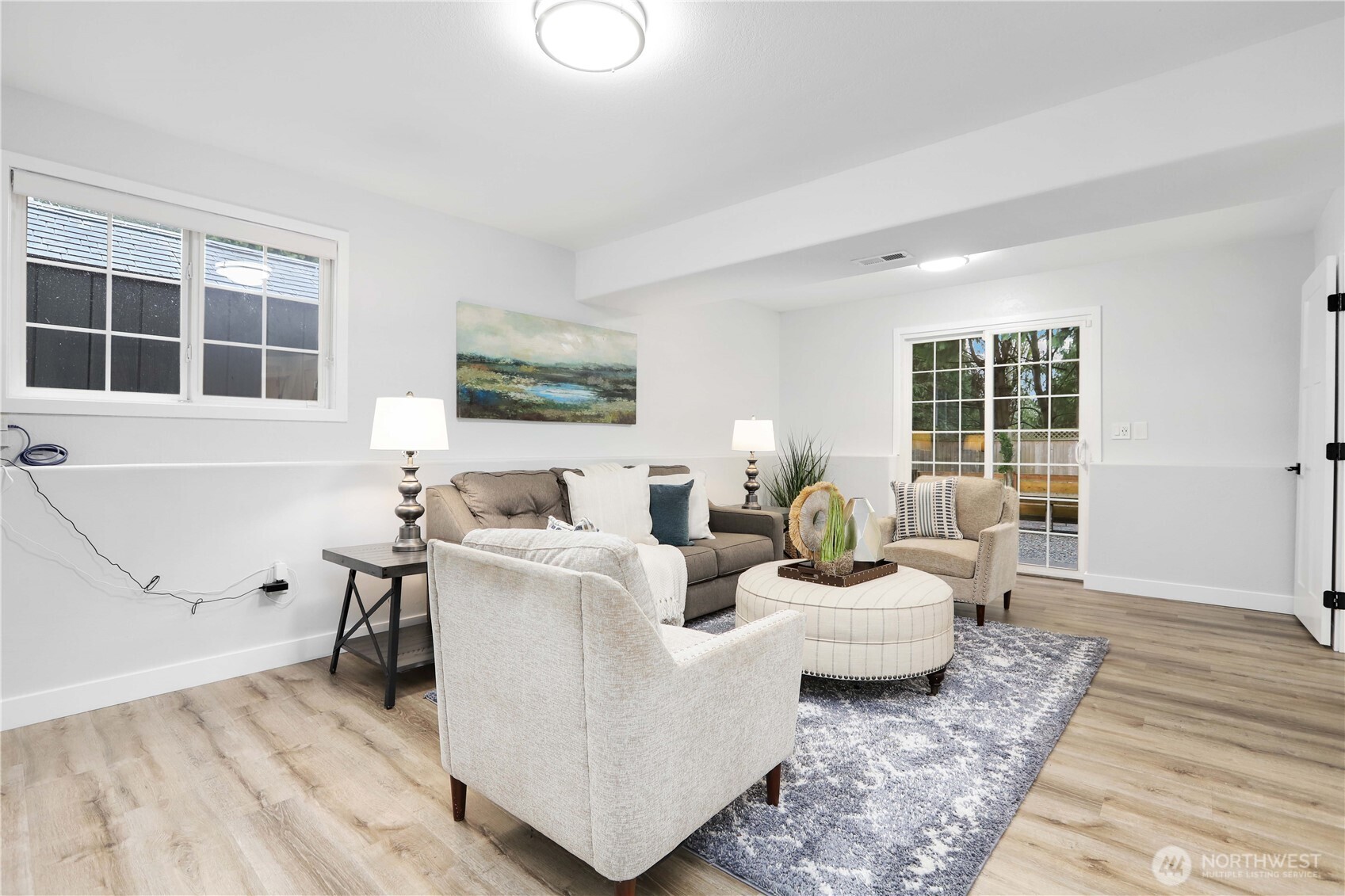 1822 171st Place Southeast Bothell, WA 98012 - Photo 24 of 36 a living room with furniture and a window