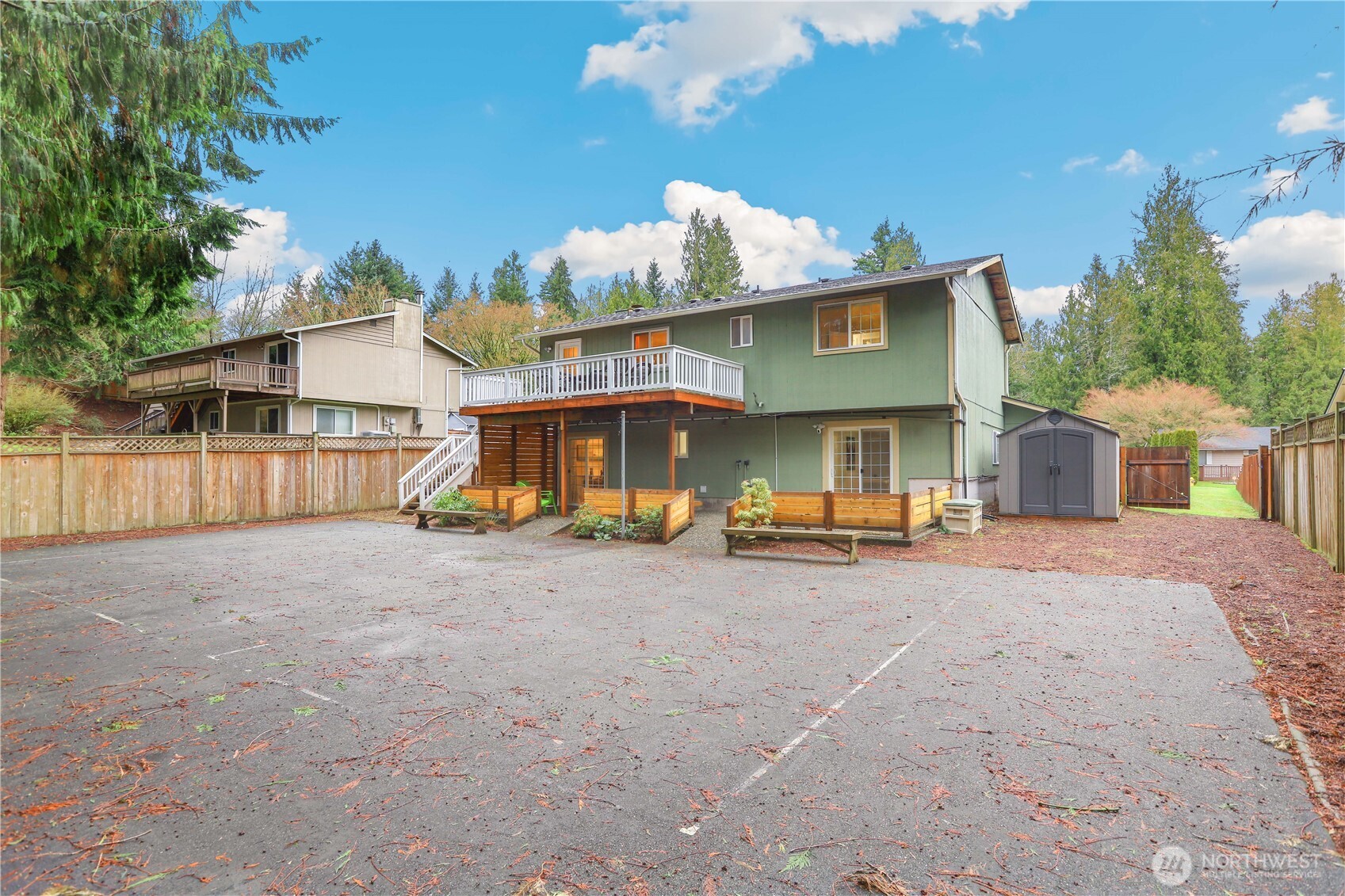 1822 171st Place Southeast Bothell, WA 98012 - Photo 36 of 36 a view of a house with a patio and a yard